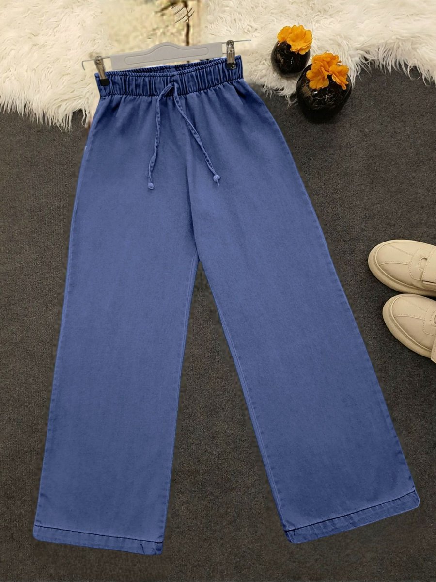 Hijabaya Bol Paça Beli Lastikli Bağcık Detaylı Kot Pantolon