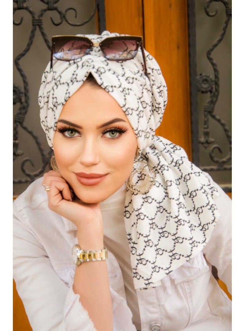 AİŞE TESETTÜR Hat Desen Tokalı Bone