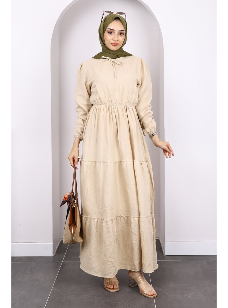 İmaj Butik Vizon Yaka Bağlamalı Eteği Katlı Muslin Elbise İmaj Butik Vizon Yaka Bağlamalı Eteği Katlı Muslin Elbise