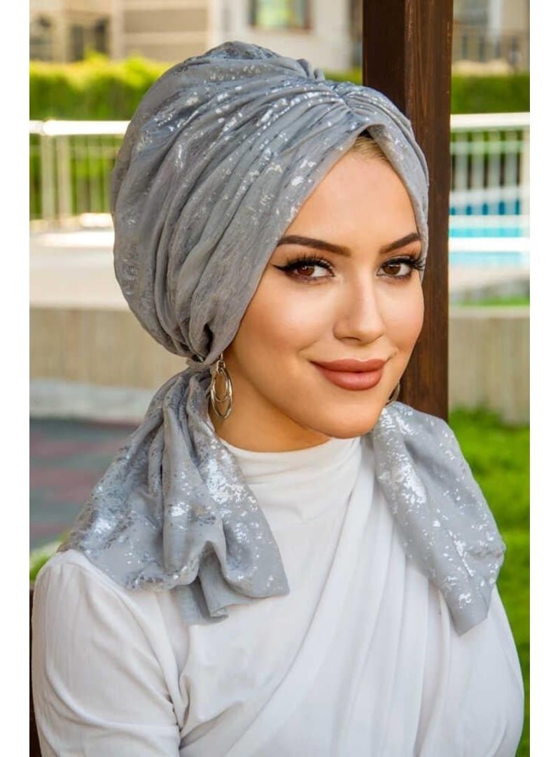 AİŞE TESETTÜR Gümüş Varaklı Tokalı Bone AİŞE TESETTÜR Gümüş Varaklı Tokalı Bone