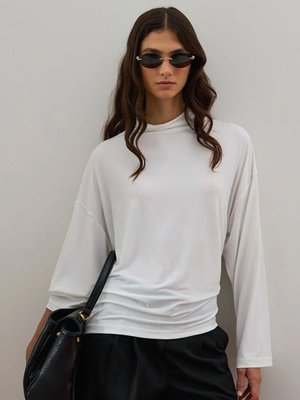 Ceylan Otantik Ekru Jarse Bluz